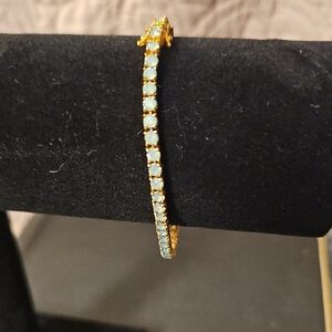 Vintage Signed Joan Rivers Elegant Gold and Green Opal Tennis Bracelet